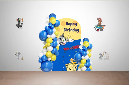 Cartoon Chase birthday decoration kit with cat and mouse wall banner and balloon garland in blue, yellow, and red